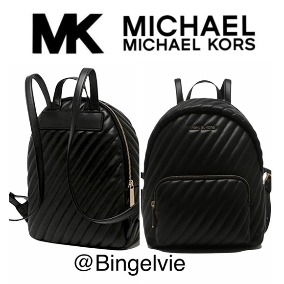 Michael Kors Handbags - Michael Kors Erin MD Backpack NWT